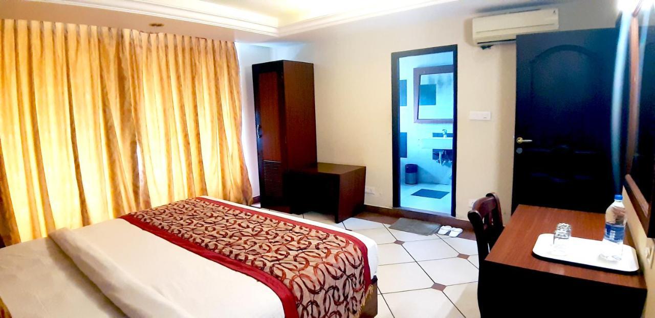 فندق أجنحة أوربان هاوس إيمرالد Kochi المظهر الخارجي الصورة